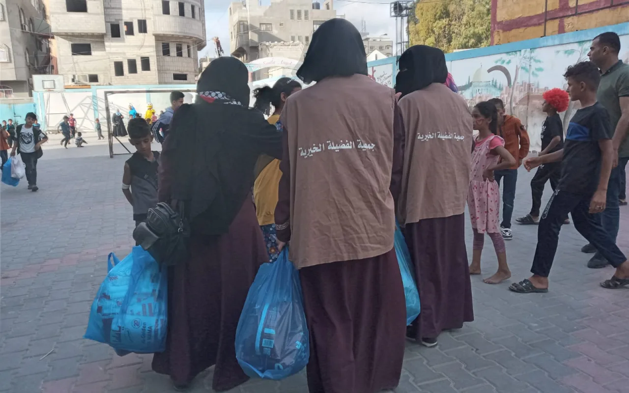 زيارة جمعية الفضيلة النازحين في مراكز الايواء أثناء العدوان الاسرائيلي على قطاع غزة