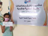 مشروع “توزيع طرود غذائية و نقدية على الأسر الفقيرة”